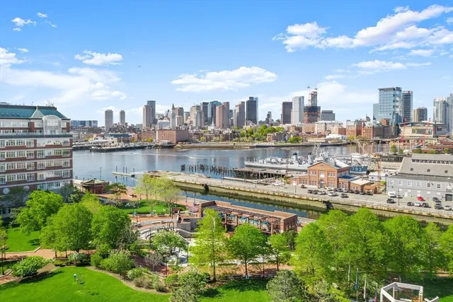 a view of a city with tall buildings