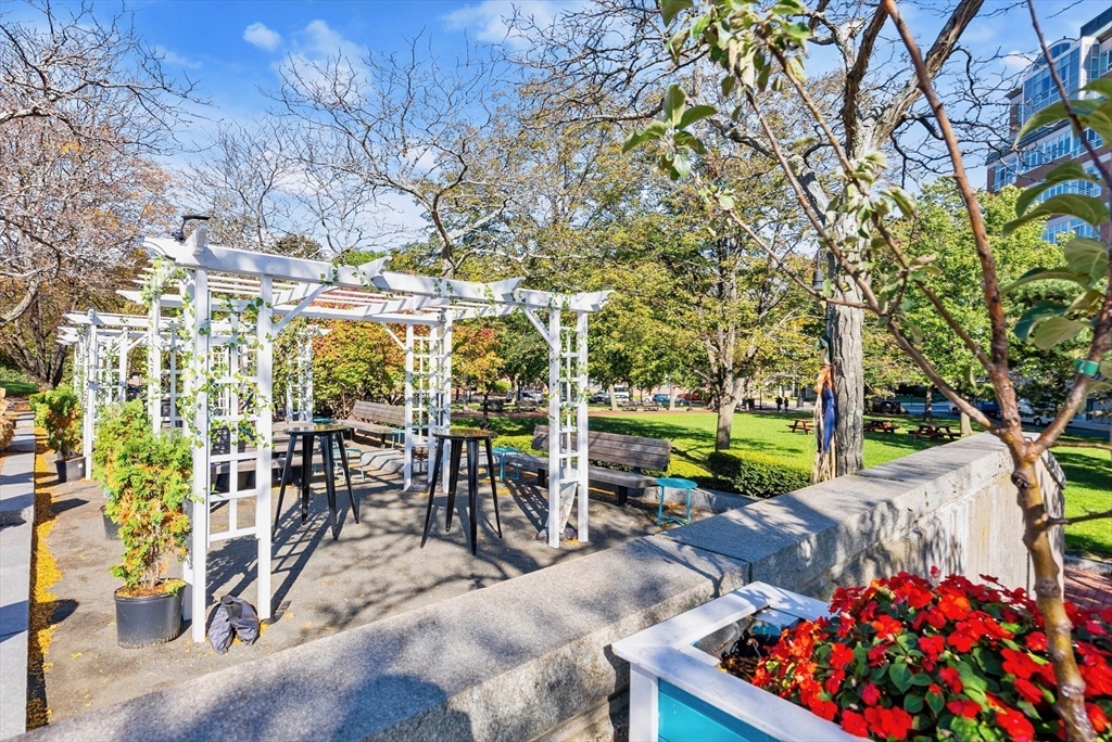 42 8th Street, Unit 1301 Boston, MA 02129 - Photo 21 of 23 a view of an chairs and tables in the patio