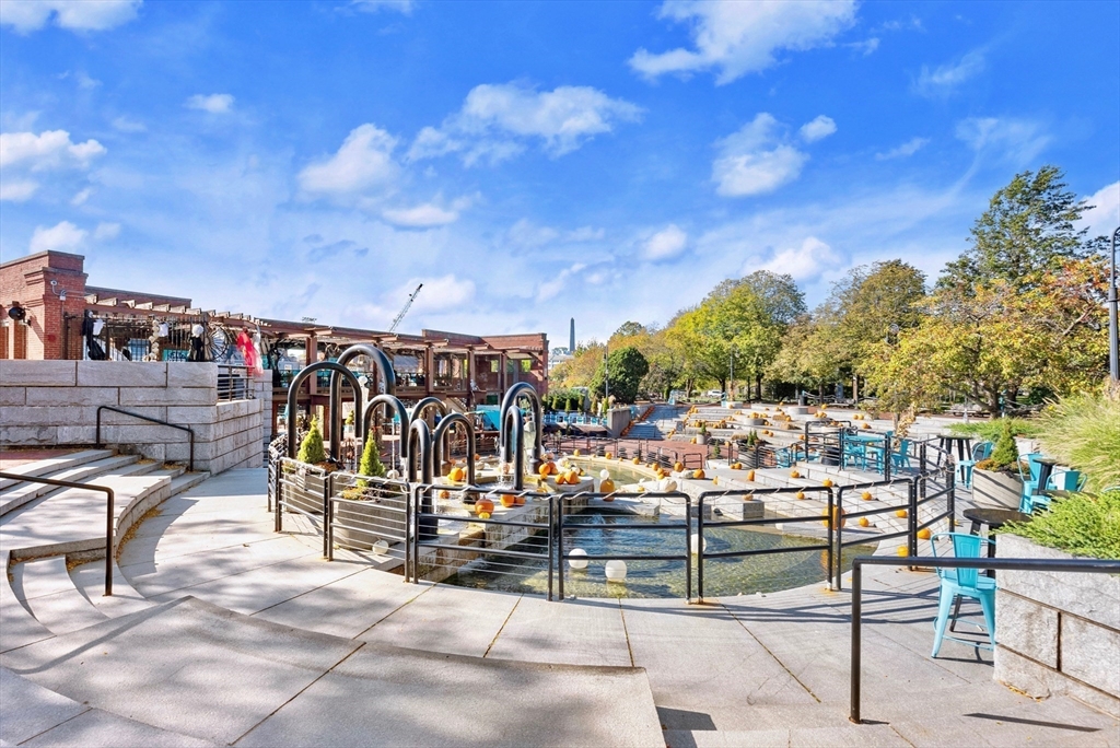 42 8th Street, Unit 1301 Boston, MA 02129 - Photo 22 of 23 a view of a chairs and tables in patio