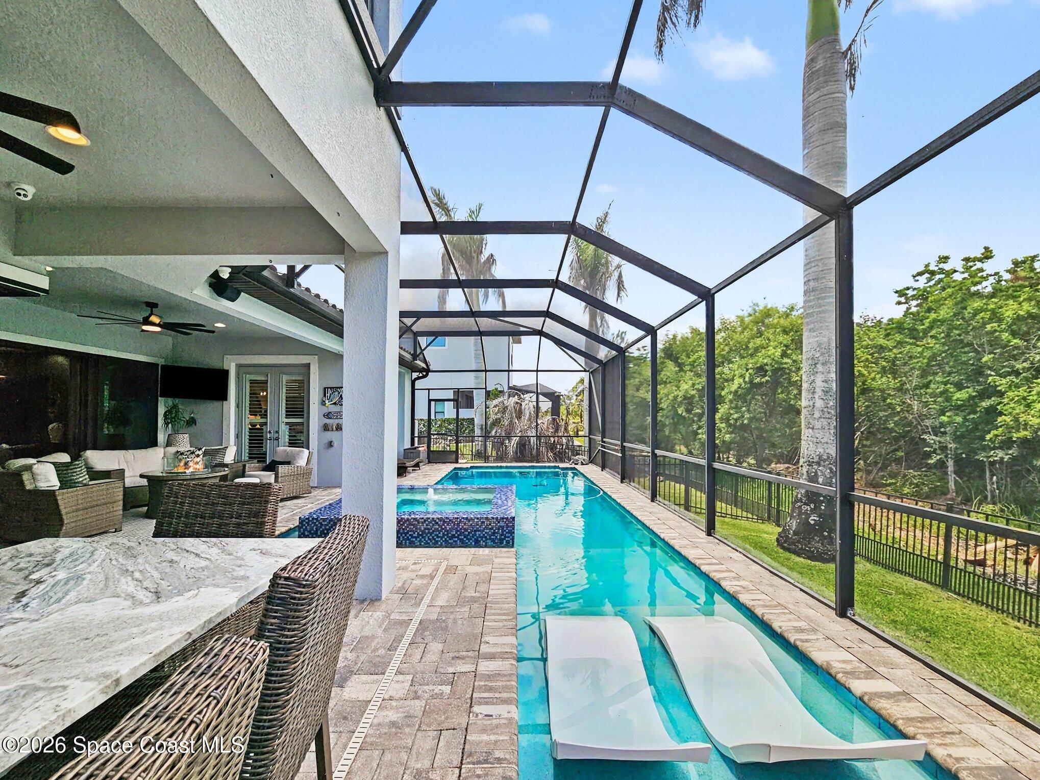 5008 Duson Way Rockledge, FL 32955 - Photo 29 of 54 Baja Loungers in Pool