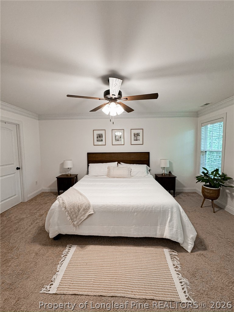 93 Falcon Ridge Drive Spring Lake, NC 28390 - Photo 27 of 50 a bedroom with a bed and window