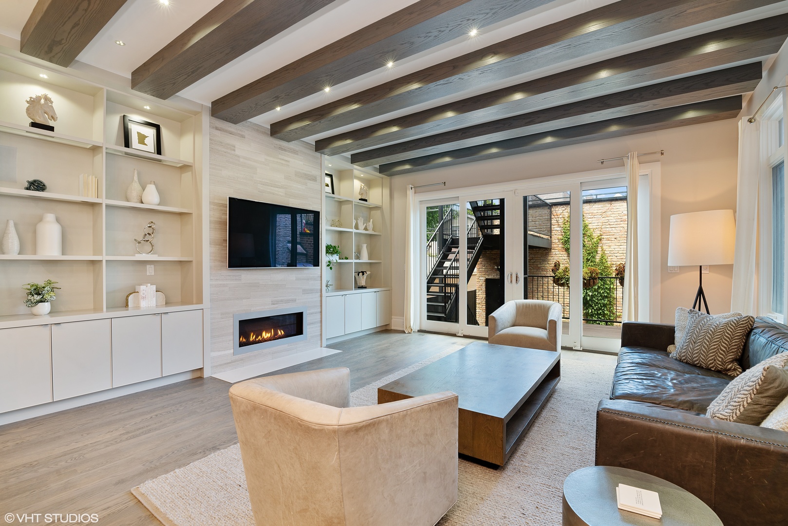 1428 West Wolfram Street Chicago, IL 60657 - Photo 15 of 47 a living room with furniture fireplace and flat screen tv