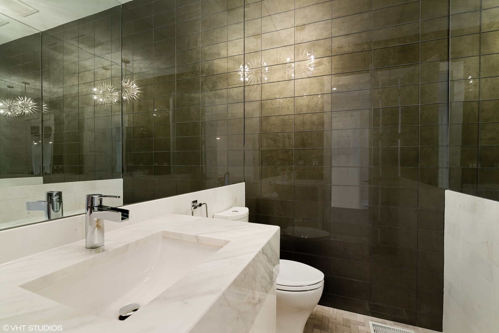 1428 West Wolfram Street Chicago, IL 60657 - Photo 18 of 47 a bathroom with a sink a toilet and shower