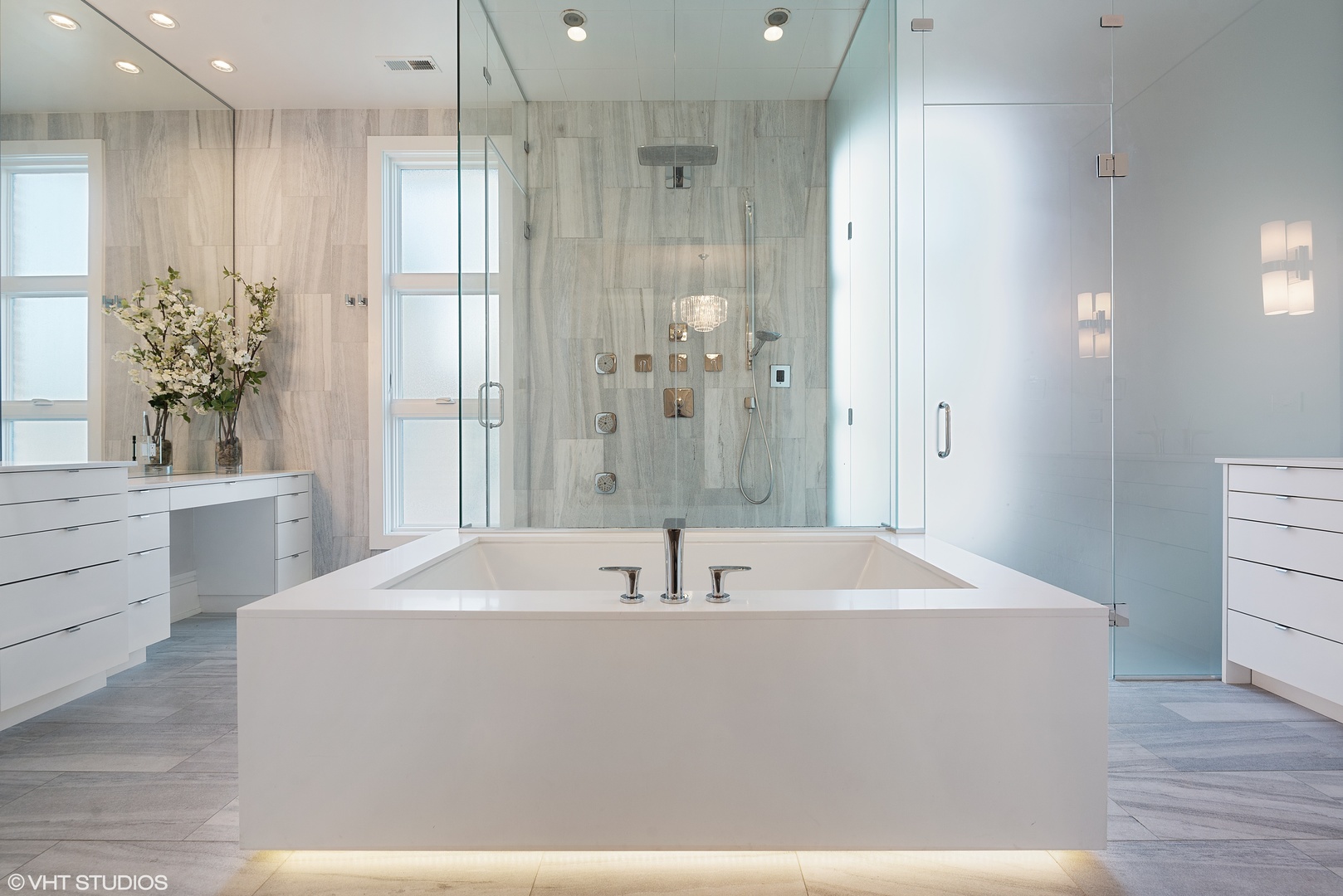 1428 West Wolfram Street Chicago, IL 60657 - Photo 22 of 47 a bathroom with a sink a mirror and a bathtub