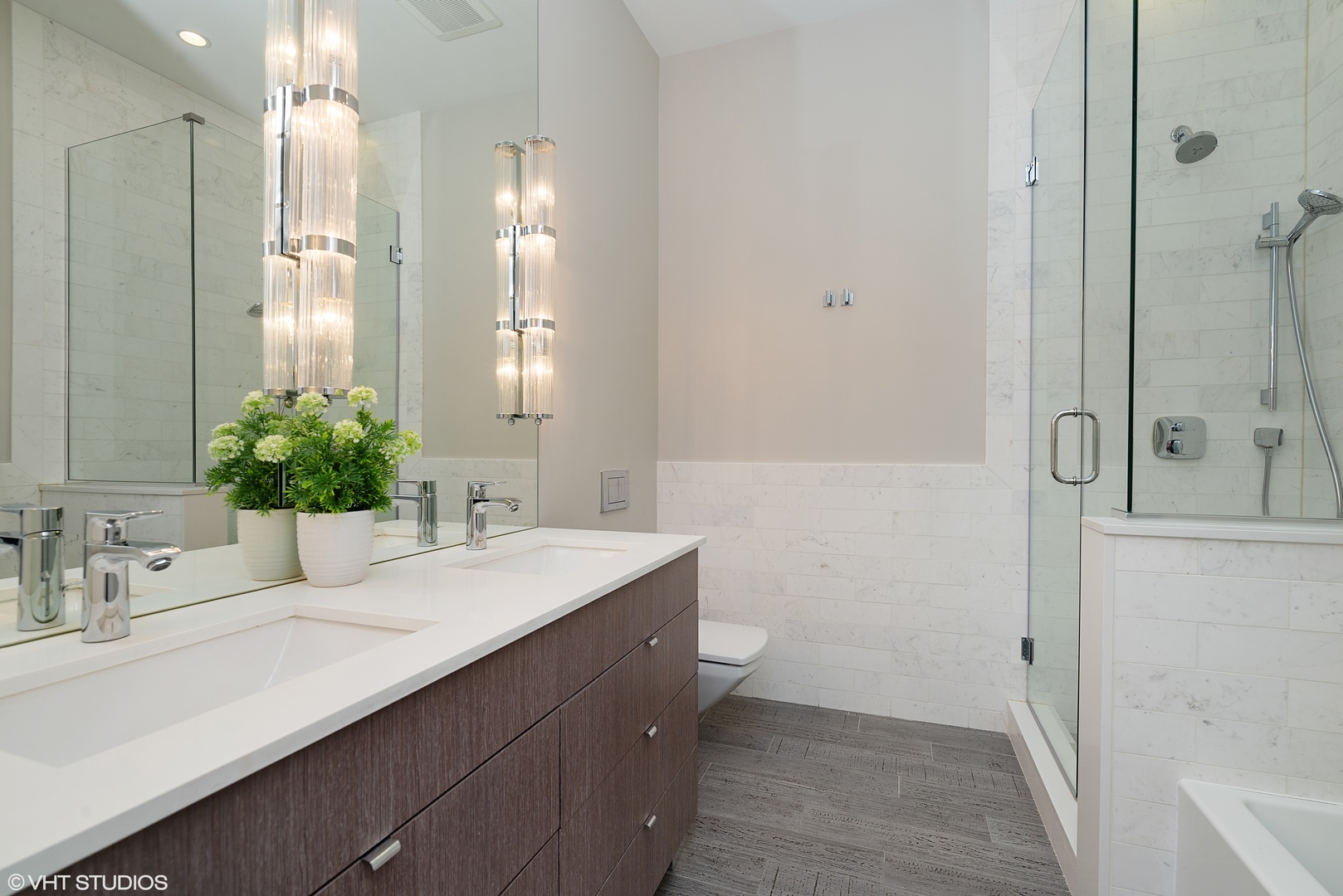 1428 West Wolfram Street Chicago, IL 60657 - Photo 28 of 47 a bathroom with a sink and a mirror