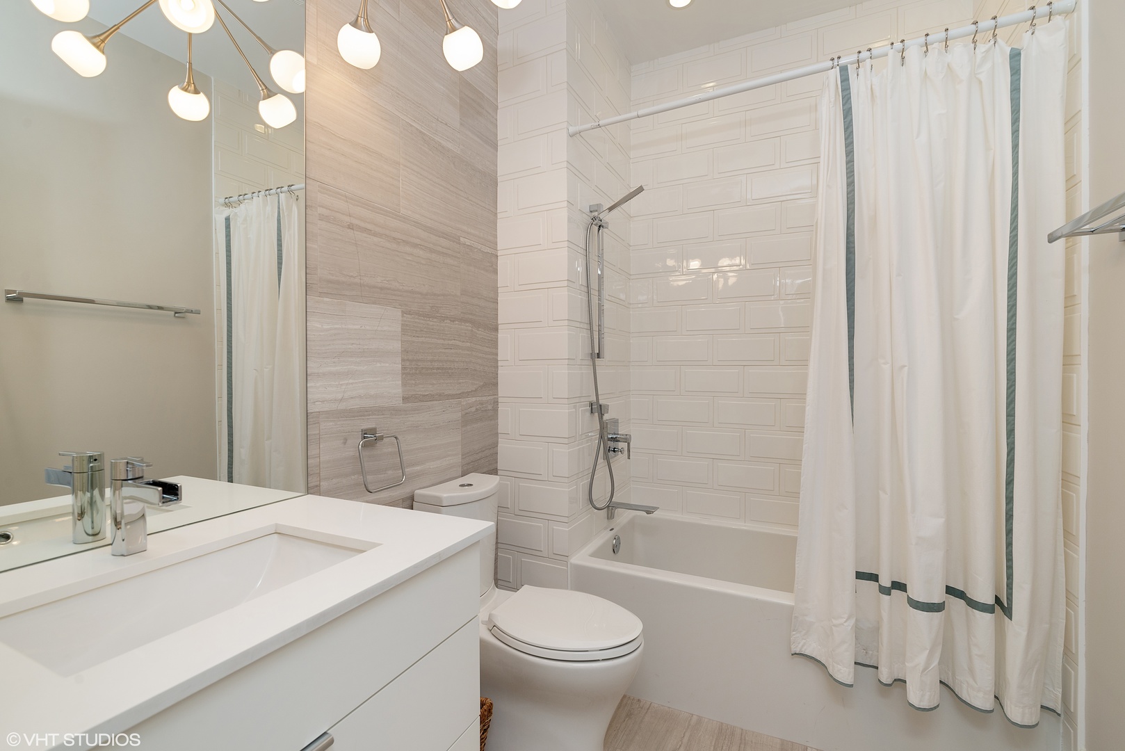 1428 West Wolfram Street Chicago, IL 60657 - Photo 34 of 47 a bathroom with a sink toilet and shower