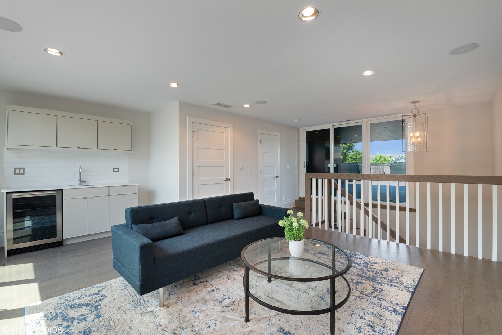 1428 West Wolfram Street Chicago, IL 60657 - Photo 36 of 47 a living room with furniture and a wooden floor