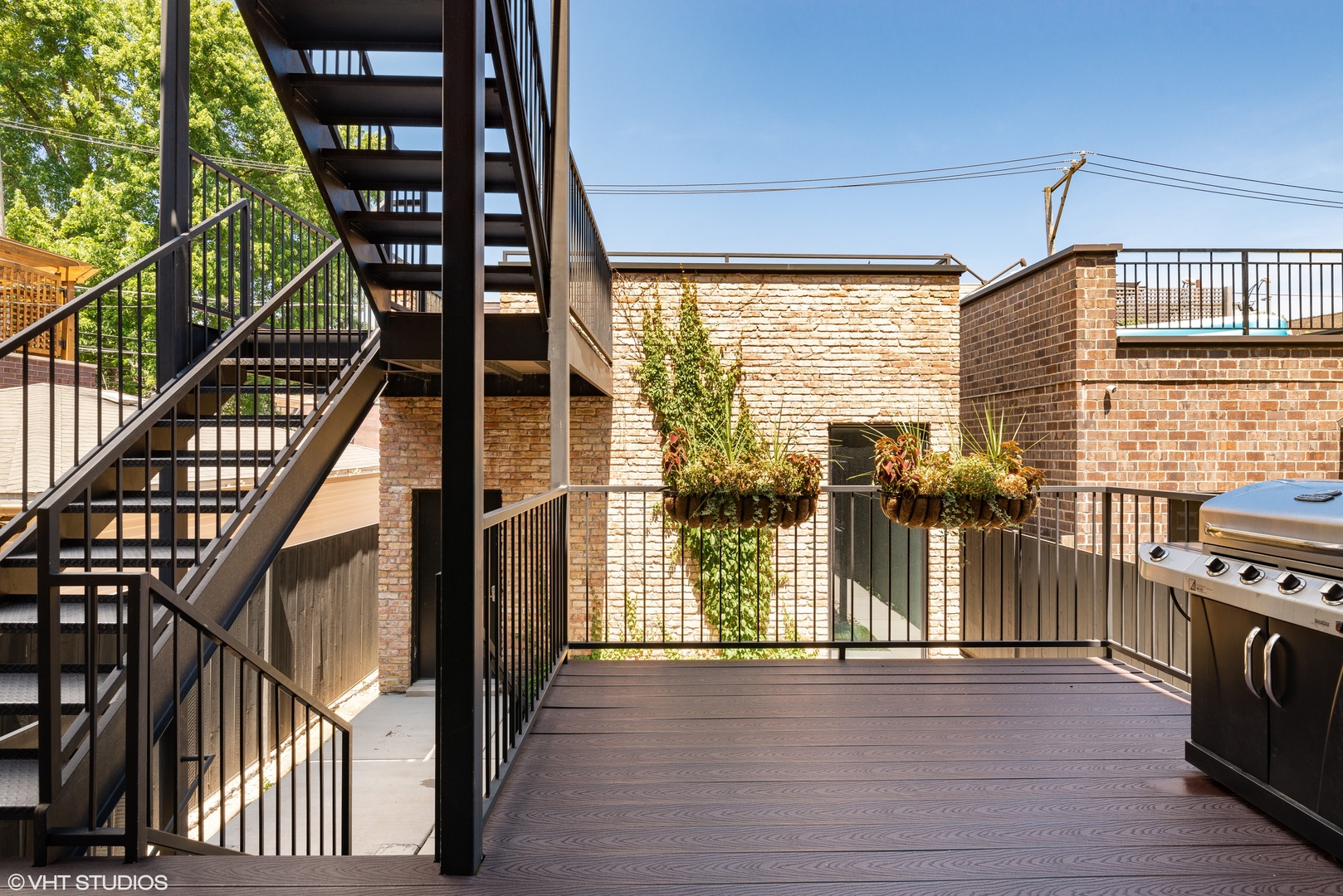 1428 West Wolfram Street Chicago, IL 60657 - Photo 43 of 47 a view of balcony with wooden floor