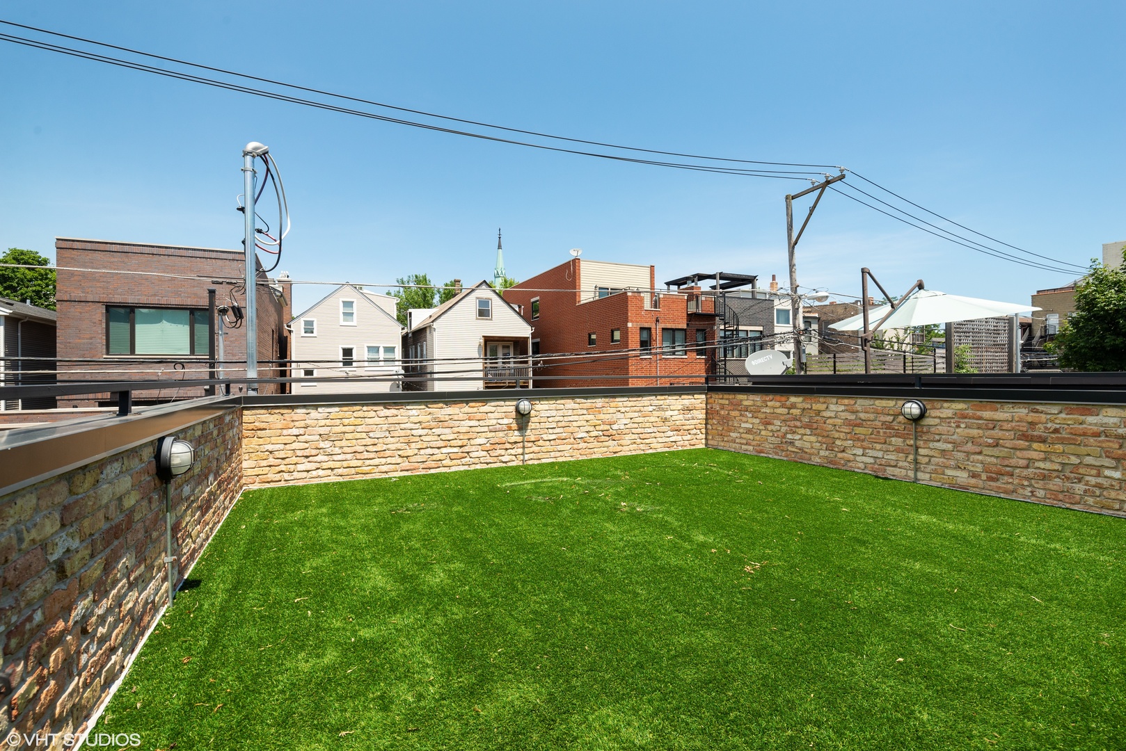 1428 West Wolfram Street Chicago, IL 60657 - Photo 44 of 47 a view of a house with a backyard