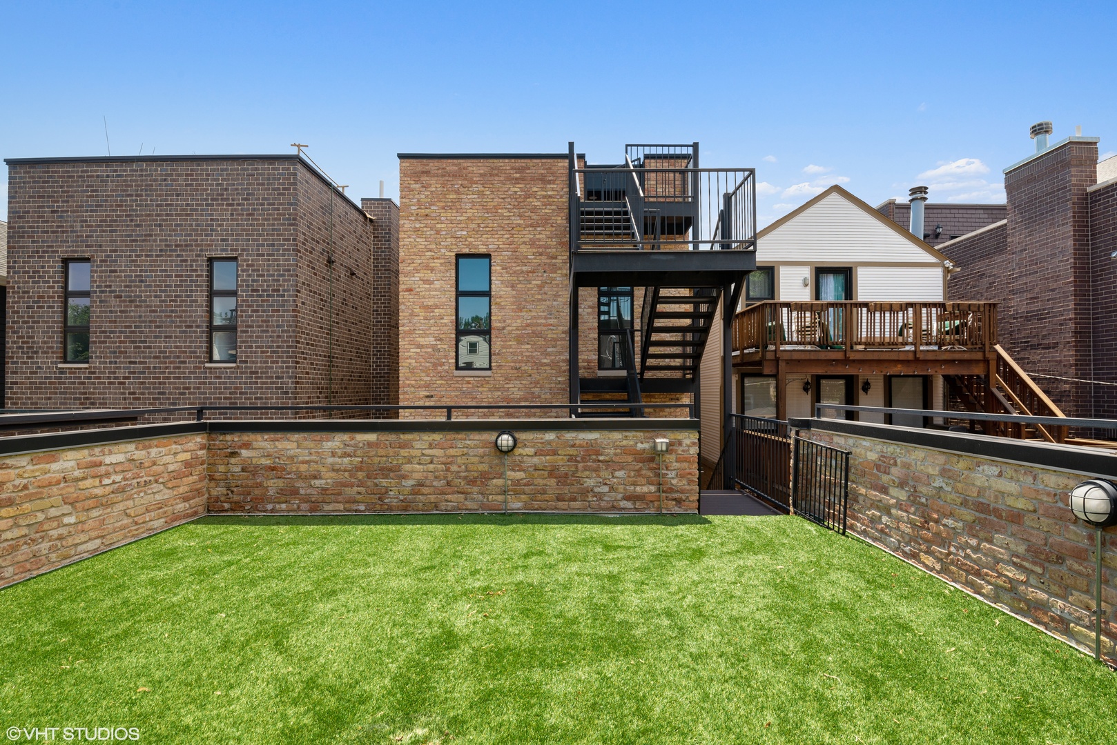 1428 West Wolfram Street Chicago, IL 60657 - Photo 45 of 47 a view of house with backyard and tub