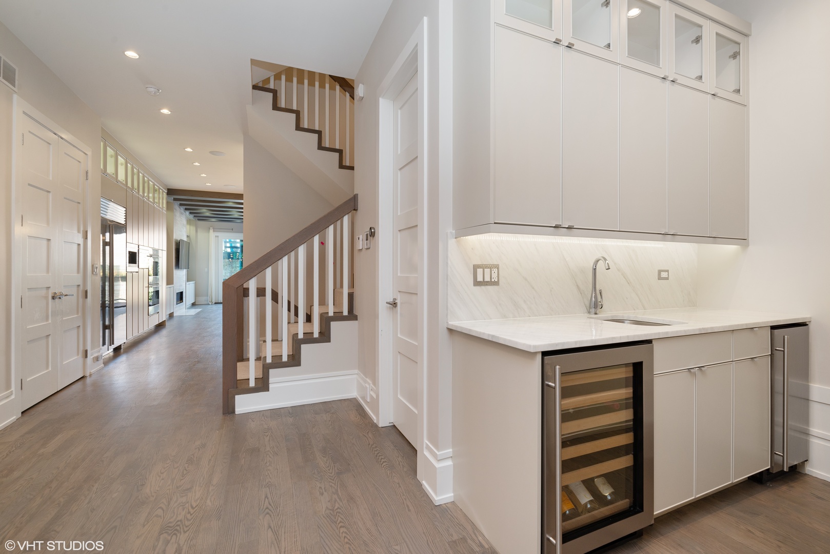 1428 West Wolfram Street Chicago, IL 60657 - Photo 8 of 47 a view of a hallway with entryway and stairs