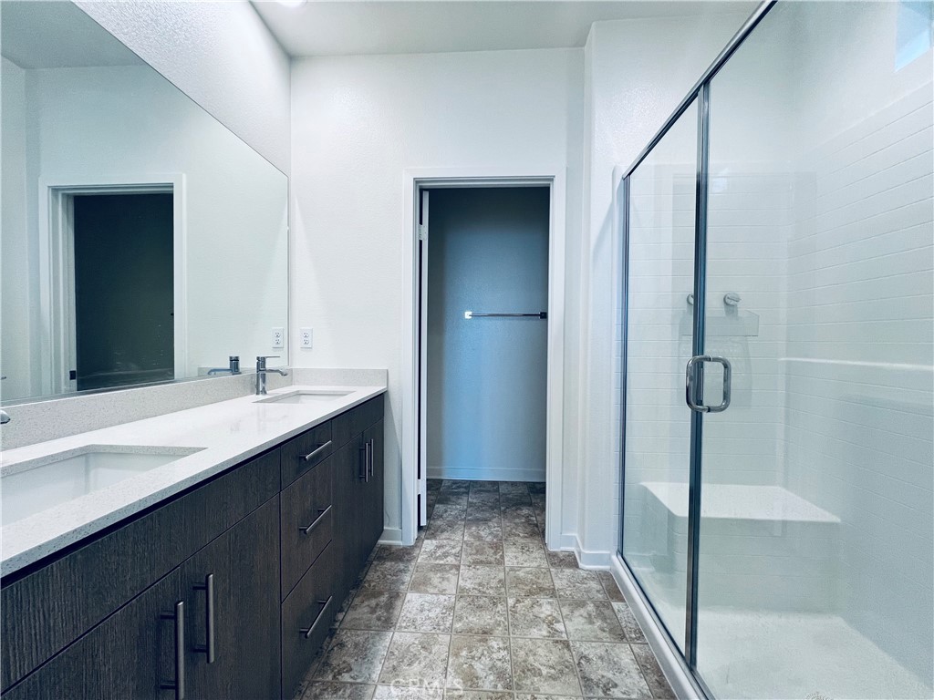 566 Boulder Circle Claremont, CA 91711 - Photo 2 of 12 a bathroom with a sink and mirror