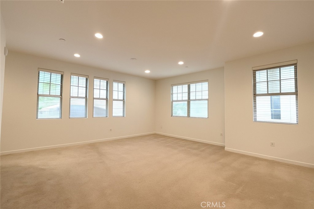 566 Boulder Circle Claremont, CA 91711 - Photo 5 of 12 an empty room with windows