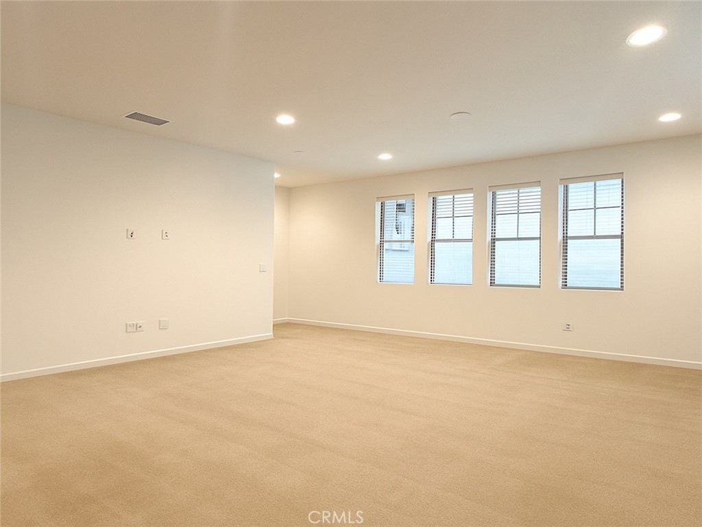 566 Boulder Circle Claremont, CA 91711 - Photo 6 of 12 an empty room with windows