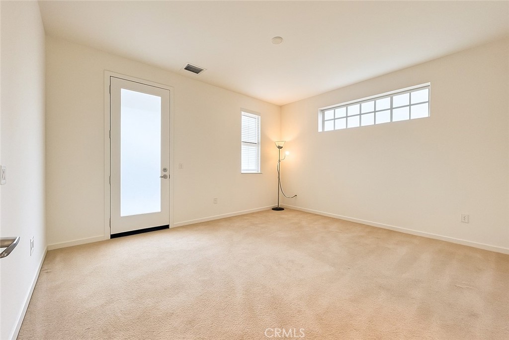 566 Boulder Circle Claremont, CA 91711 - Photo 7 of 12 a view of an empty room with windows