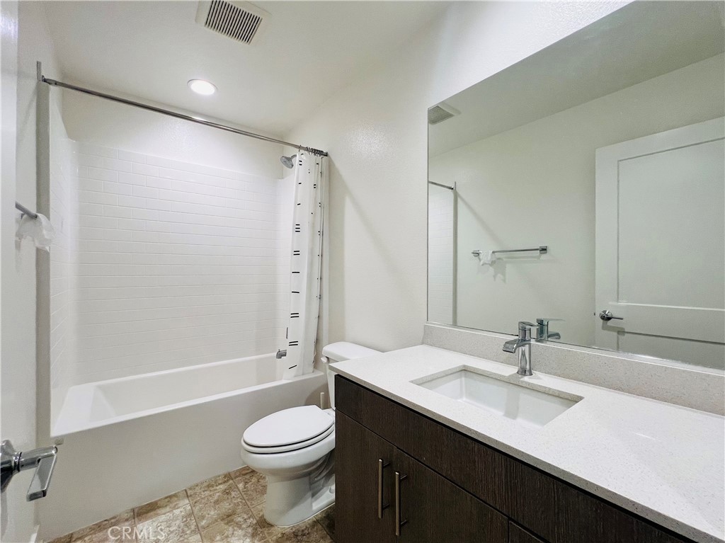 566 Boulder Circle Claremont, CA 91711 - Photo 9 of 12 a bathroom with a sink a toilet and shower