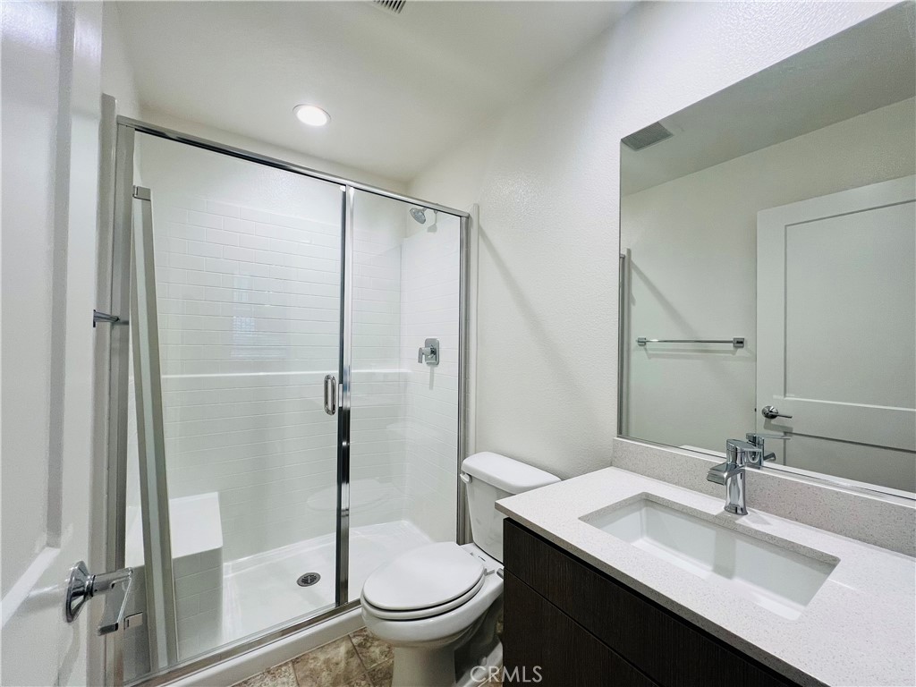 566 Boulder Circle Claremont, CA 91711 - Photo 10 of 12 a bathroom with a sink toilet and shower