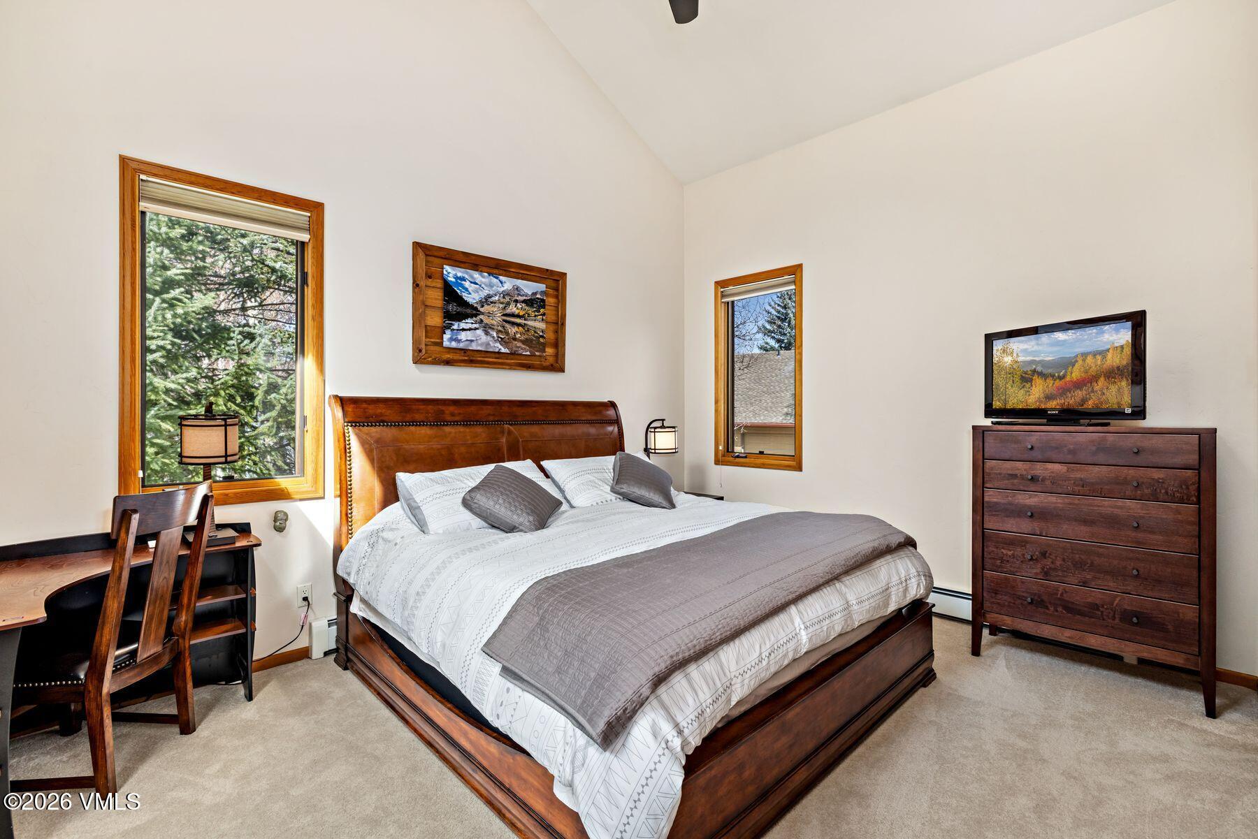 91 Creamery Trail Edwards, CO 81632 - Photo 24 of 44 a bedroom with a bed and furniture