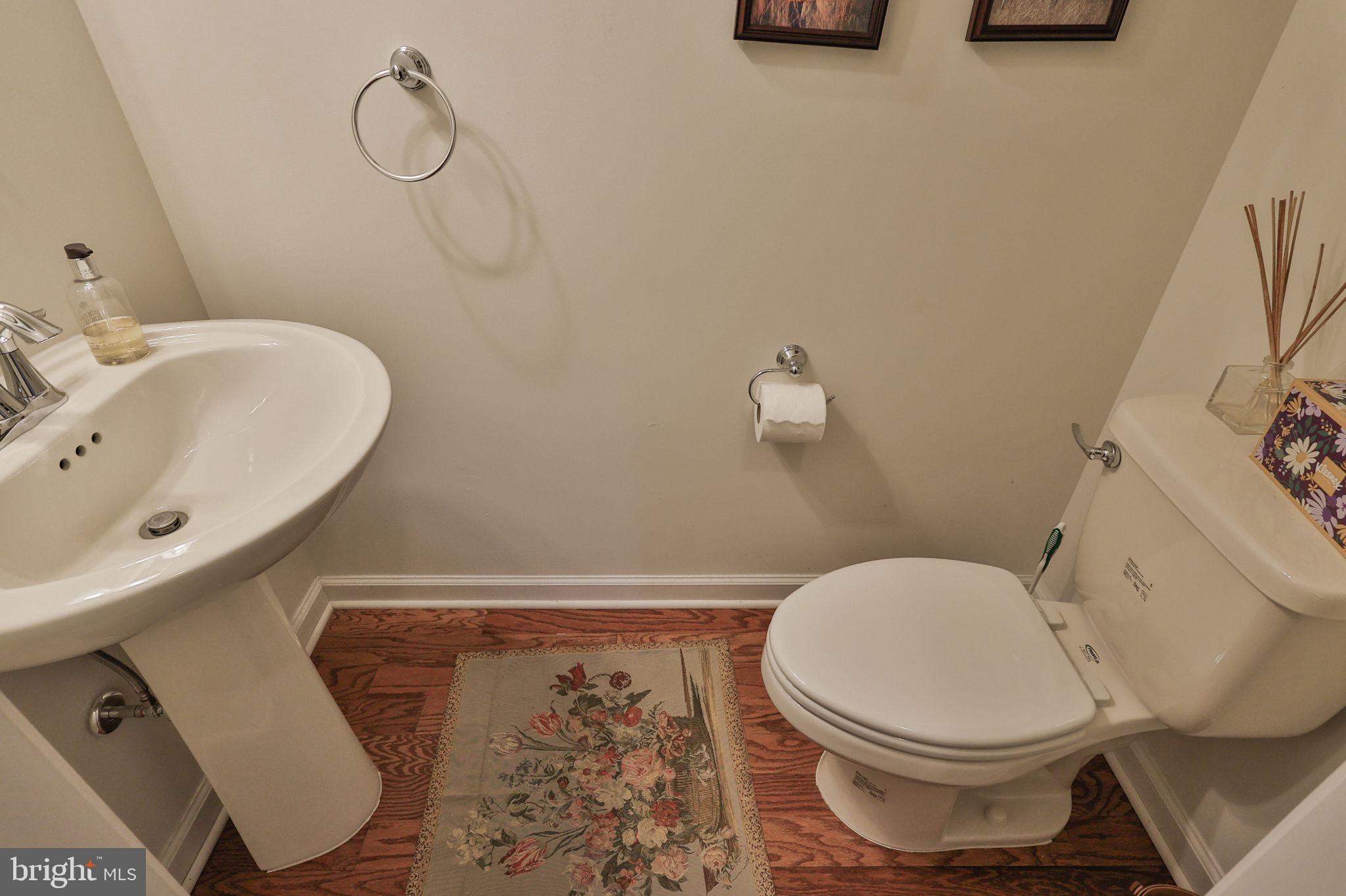 3872 Mink Road Emmaus, PA 18049 - Photo 15 of 39 a bathroom with a toilet sink and mirror