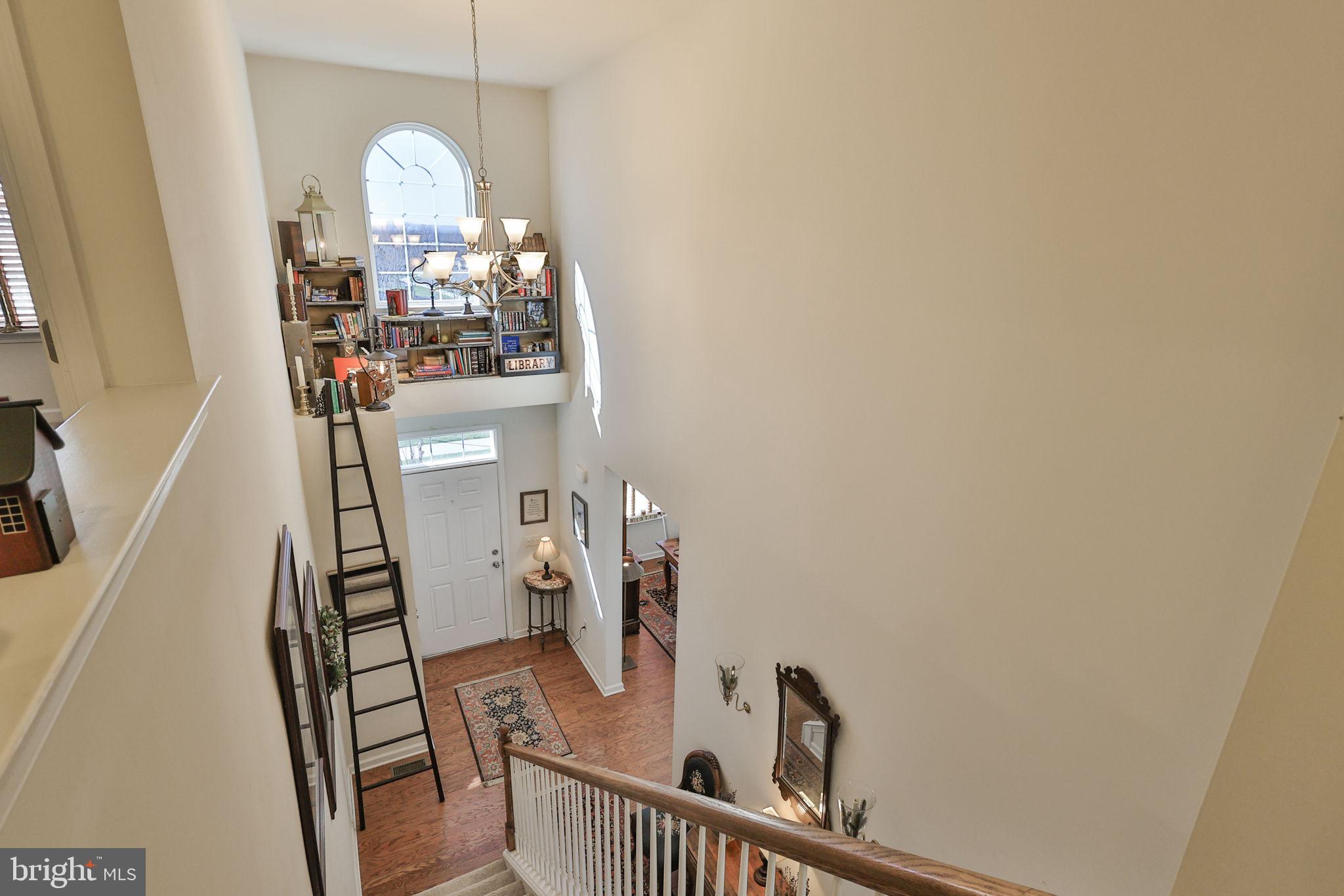 3872 Mink Road Emmaus, PA 18049 - Photo 21 of 39 a view of a living room with furniture and wooden floor