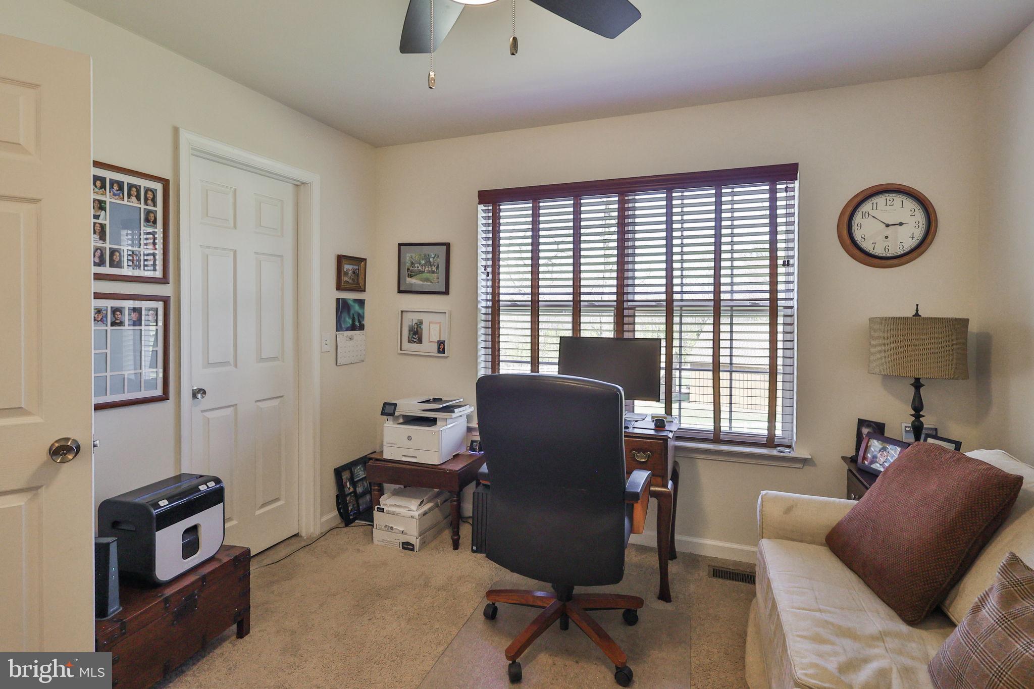 3872 Mink Road Emmaus, PA 18049 - Photo 28 of 39 a view of a livingroom with workspace and a couch