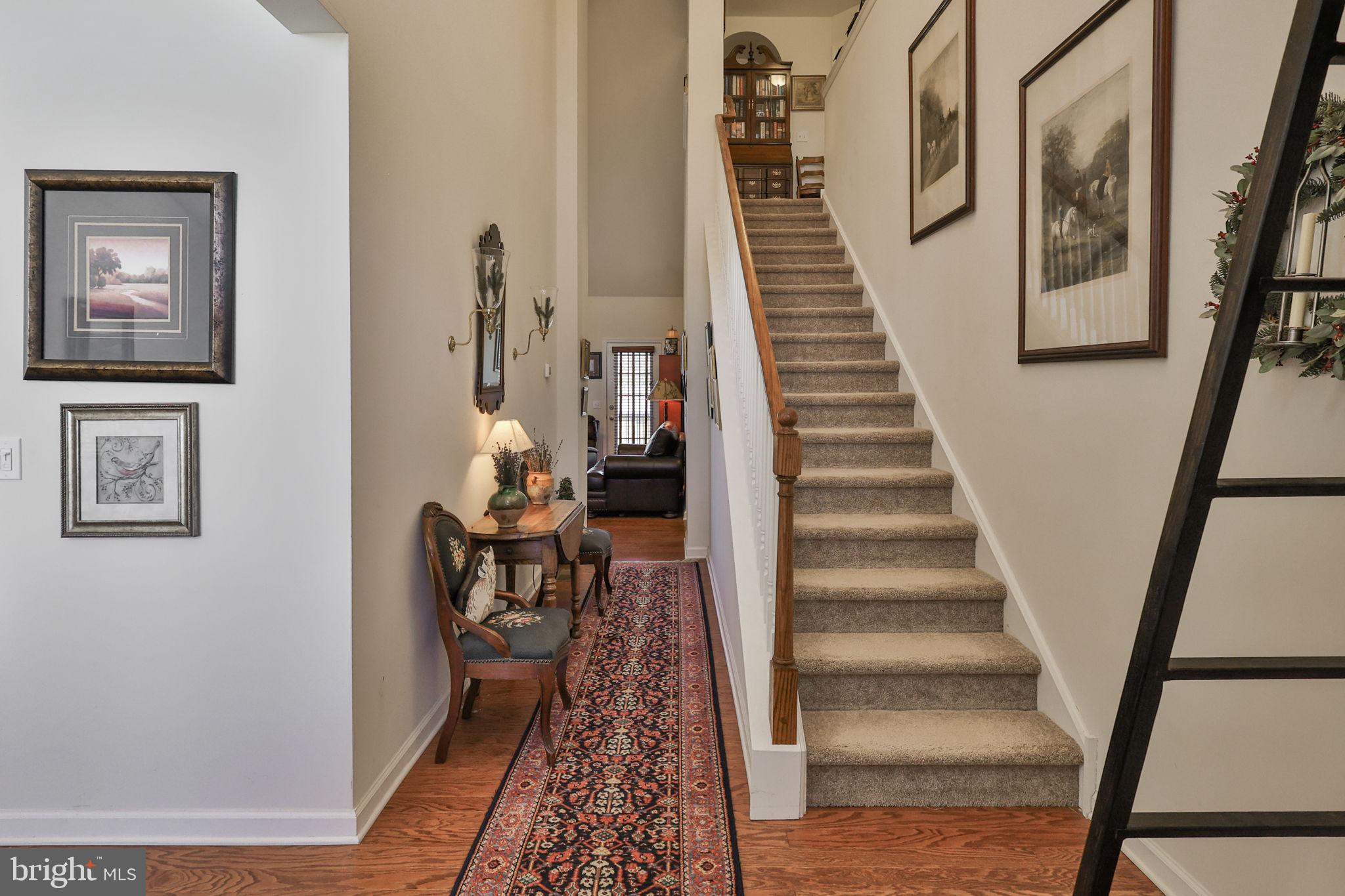 3872 Mink Road Emmaus, PA 18049 - Photo 3 of 39 a view of entryway and hall with wooden floor