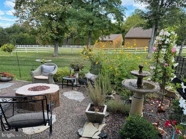 3872 Mink Road Emmaus, PA 18049 - Photo 34 of 39 a view of a chairs and table in backyard