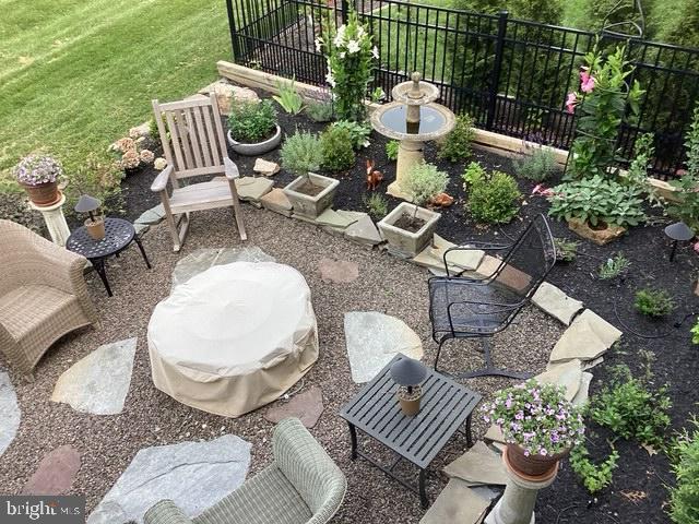 3872 Mink Road Emmaus, PA 18049 - Photo 35 of 39 a view of an outdoor sitting area in a backyard