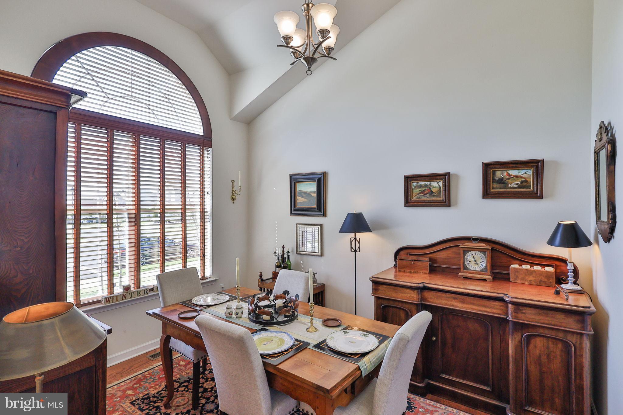 3872 Mink Road Emmaus, PA 18049 - Photo 4 of 39 a view of a dining room with furniture window and outside view