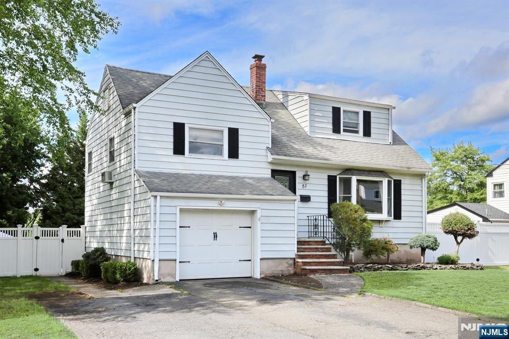 87 Barbara Road Dumont, NJ 07628 - Photo 3 of 48 a view of a white house
