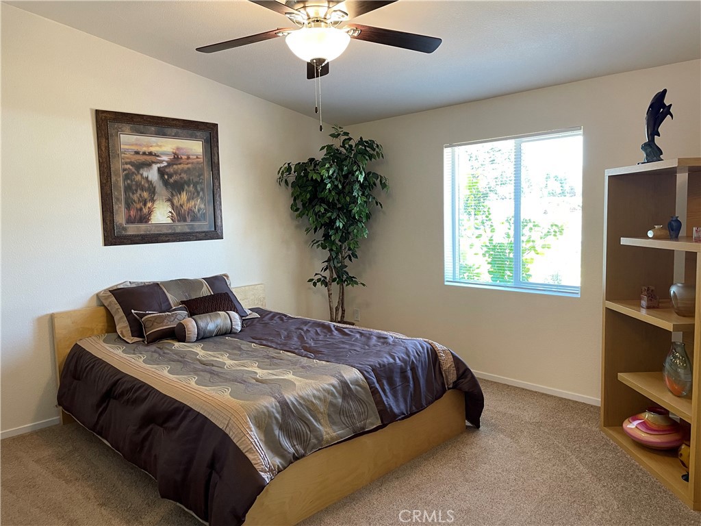 1340 Bille Road, Unit 13 Paradise, CA 95969 - Photo 16 of 31 a bedroom with bed and window