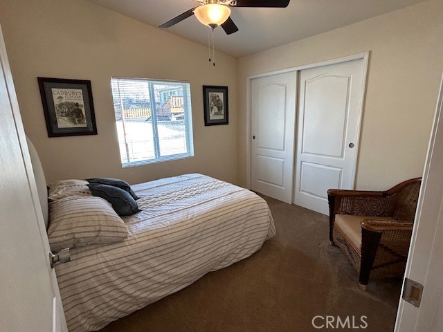 1340 Bille Road, Unit 13 Paradise, CA 95969 - Photo 21 of 31 a bedroom with a bed and a chandelier
