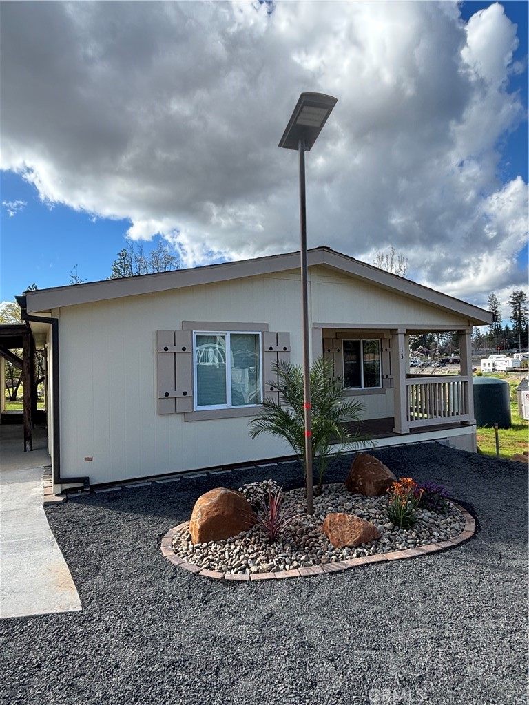 1340 Bille Road, Unit 13 Paradise, CA 95969 - Photo 4 of 31 a front view of a house with garden