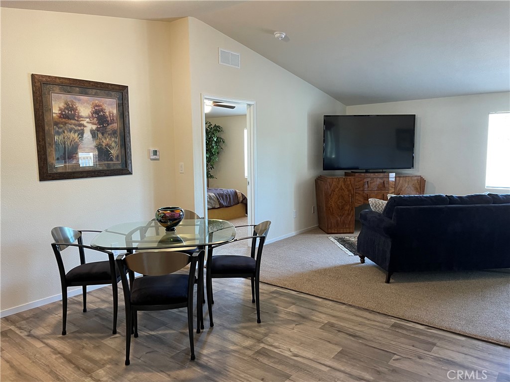 1340 Bille Road, Unit 13 Paradise, CA 95969 - Photo 9 of 31 a living room with furniture and a flat screen tv