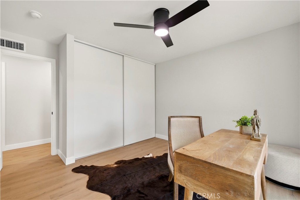 26418 Sand Canyon Road Canyon Country, CA 91387 - Photo 22 of 70 a bedroom with a bed and a table