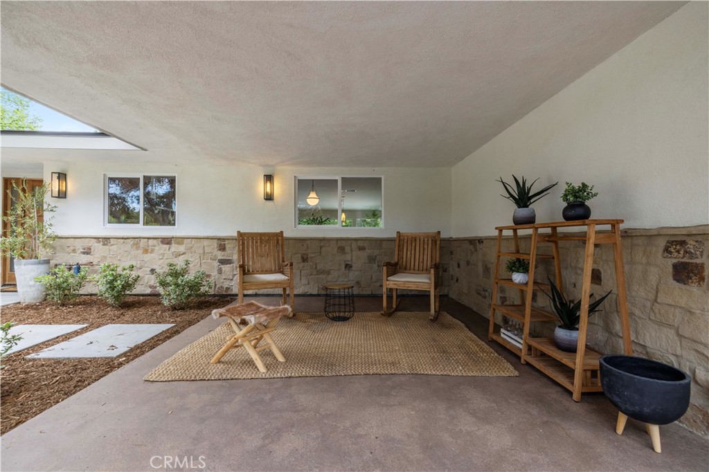 26418 Sand Canyon Road Canyon Country, CA 91387 - Photo 3 of 70 a living room with furniture a couch and potted plant