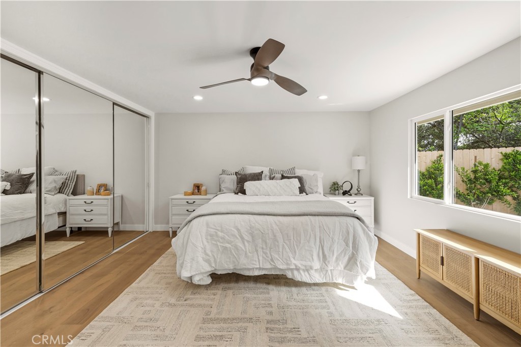 26418 Sand Canyon Road Canyon Country, CA 91387 - Photo 33 of 70 a bedroom with a large bed and a large window