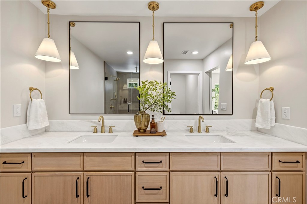 26418 Sand Canyon Road Canyon Country, CA 91387 - Photo 37 of 70 a bathroom with a sink and a mirror