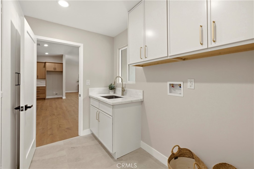 26418 Sand Canyon Road Canyon Country, CA 91387 - Photo 41 of 70 a room with a sink cabinets and utility room