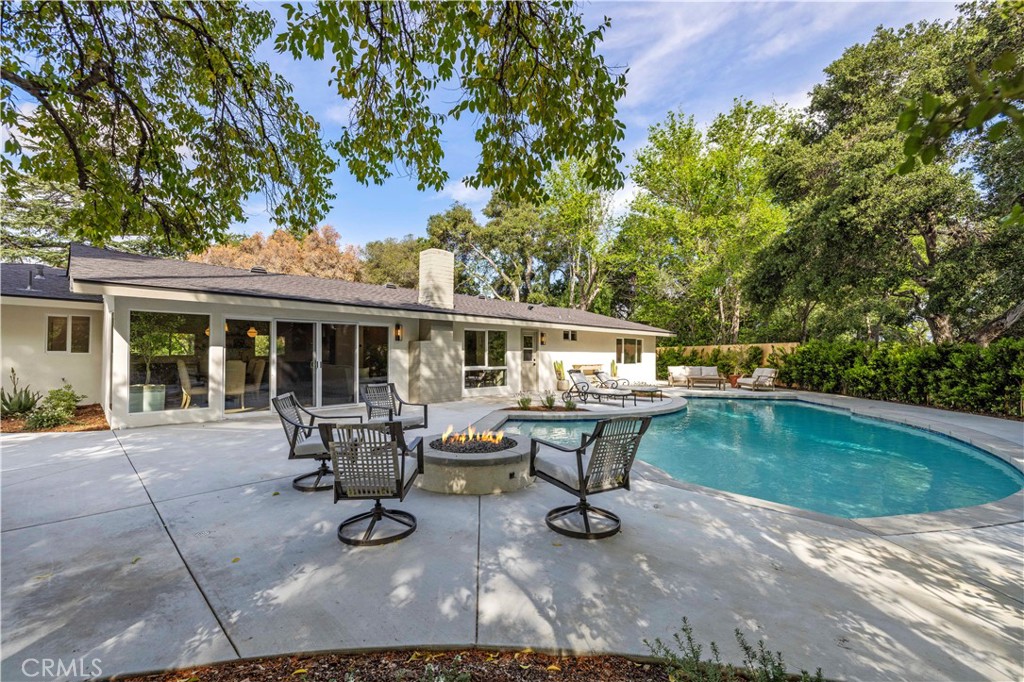 26418 Sand Canyon Road Canyon Country, CA 91387 - Photo 45 of 70 a view of a house with swimming pool and sitting area