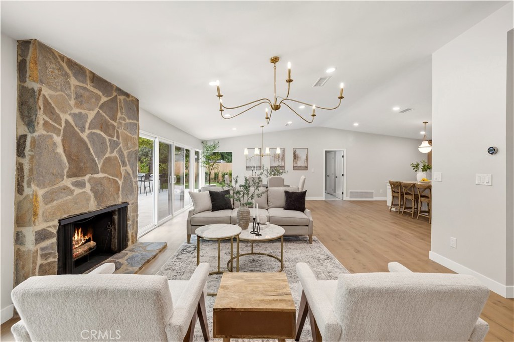 26418 Sand Canyon Road Canyon Country, CA 91387 - Photo 9 of 70 a living room with furniture fireplace and a fireplace