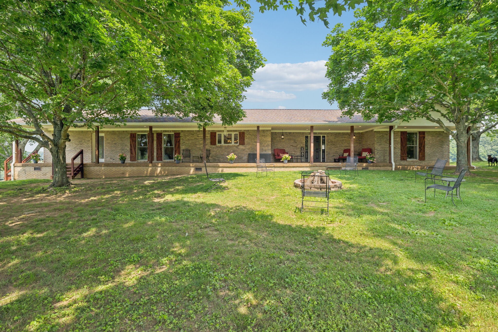 2797 Lewis Road Santa Fe, TN 38482 - Photo 5 of 92 a swimming pool view with a seating space and a garden