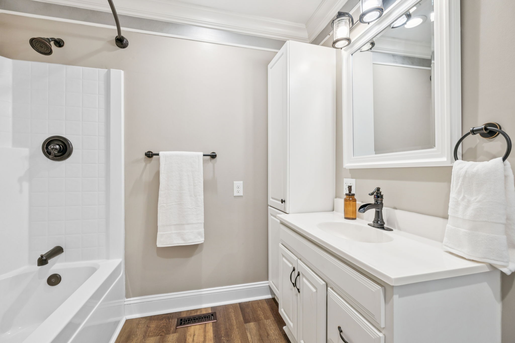 2797 Lewis Road Santa Fe, TN 38482 - Photo 59 of 92 a bathroom with a sink a granite tub shower and a sink