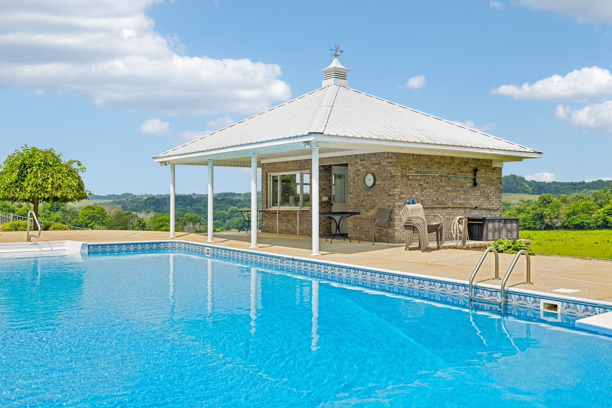 2797 Lewis Road Santa Fe, TN 38482 - Photo 71 of 92 a view of a house with a swimming pool and sitting area