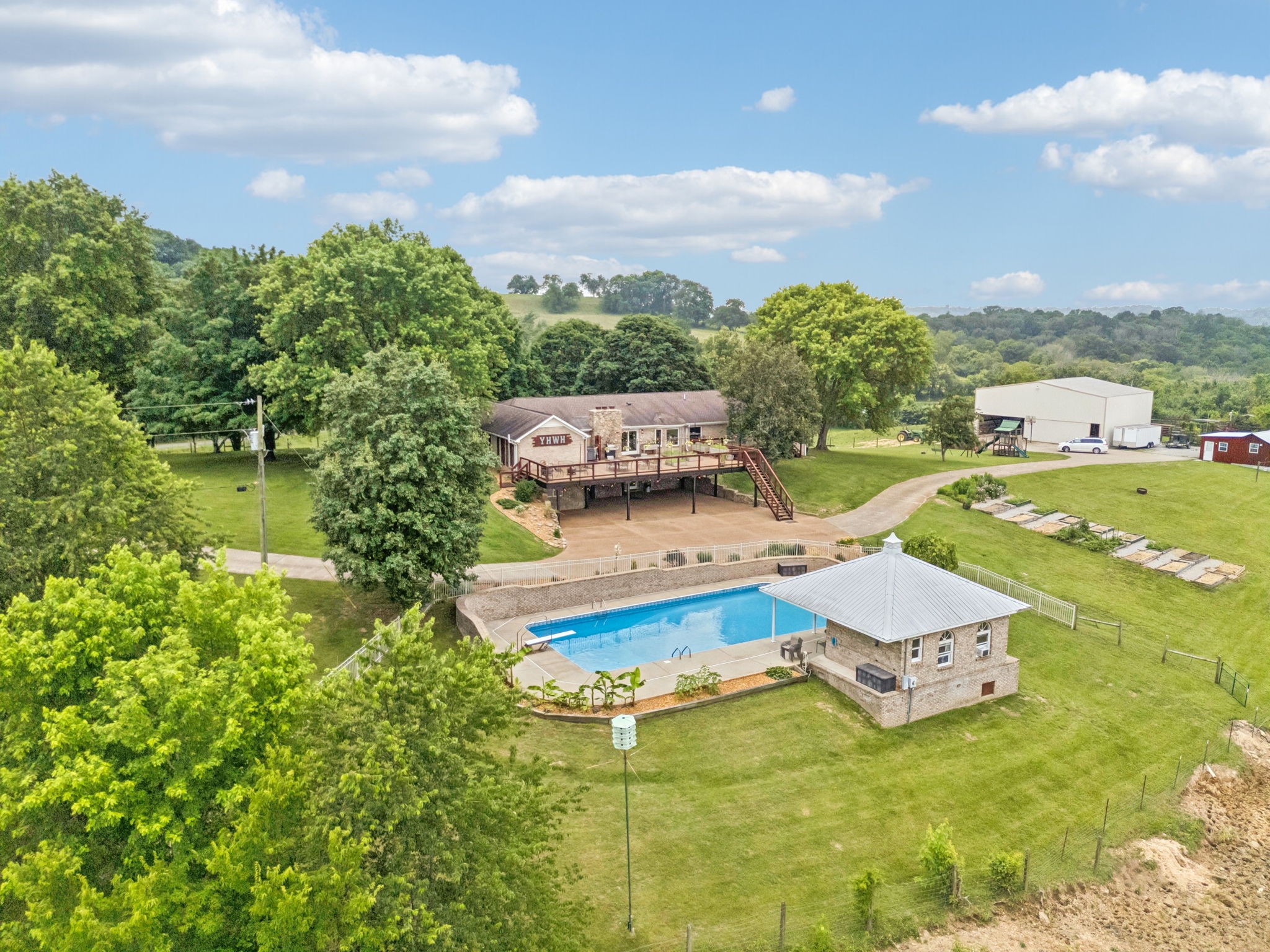 2797 Lewis Road Santa Fe, TN 38482 - Photo 90 of 92 a view of a city with lawn chairs and large trees