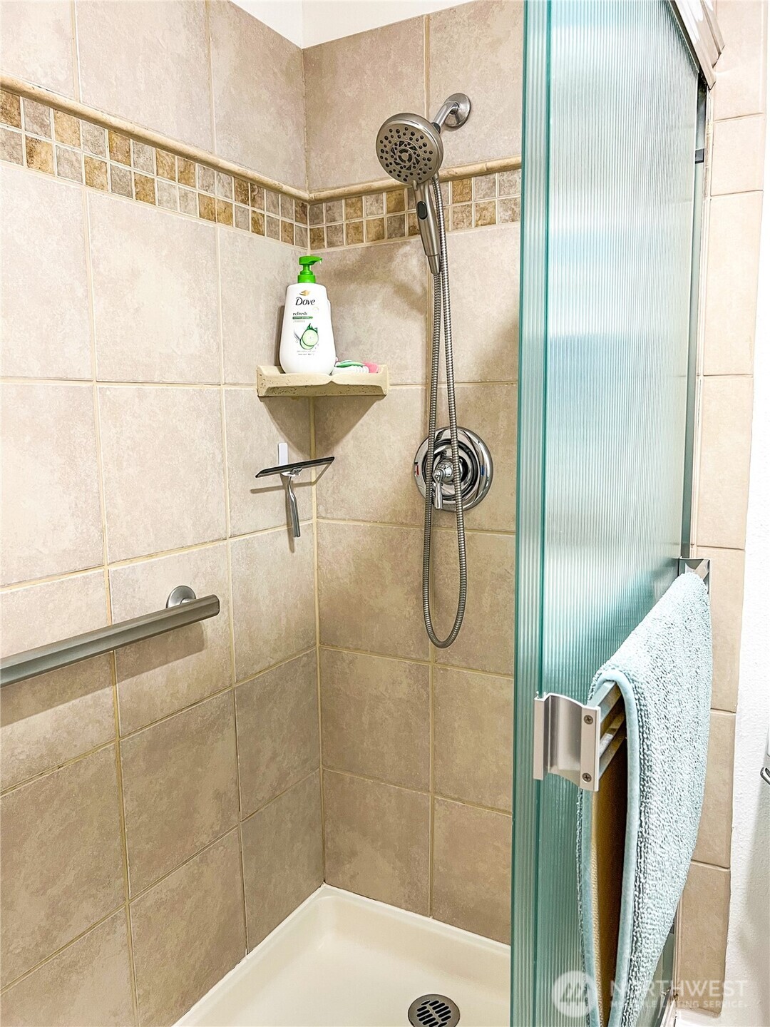 3390 Narrows Lane Northeast, Unit 101 Bremerton, WA 98310 - Photo 18 of 29 a bathroom with a shower