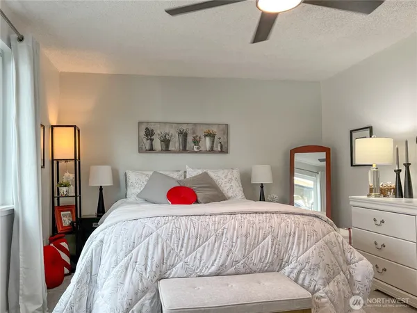 a bedroom with a bed and a closet