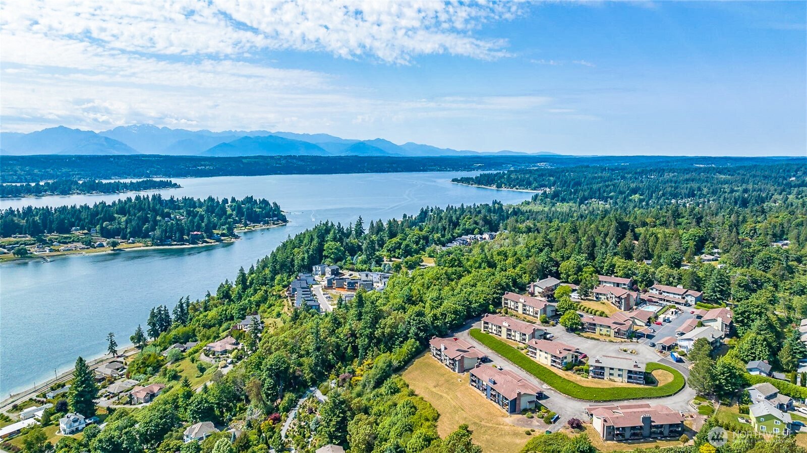 3390 Narrows Lane Northeast, Unit 101 Bremerton, WA 98310 - Photo 21 of 29 an aerial view of a city and lake view