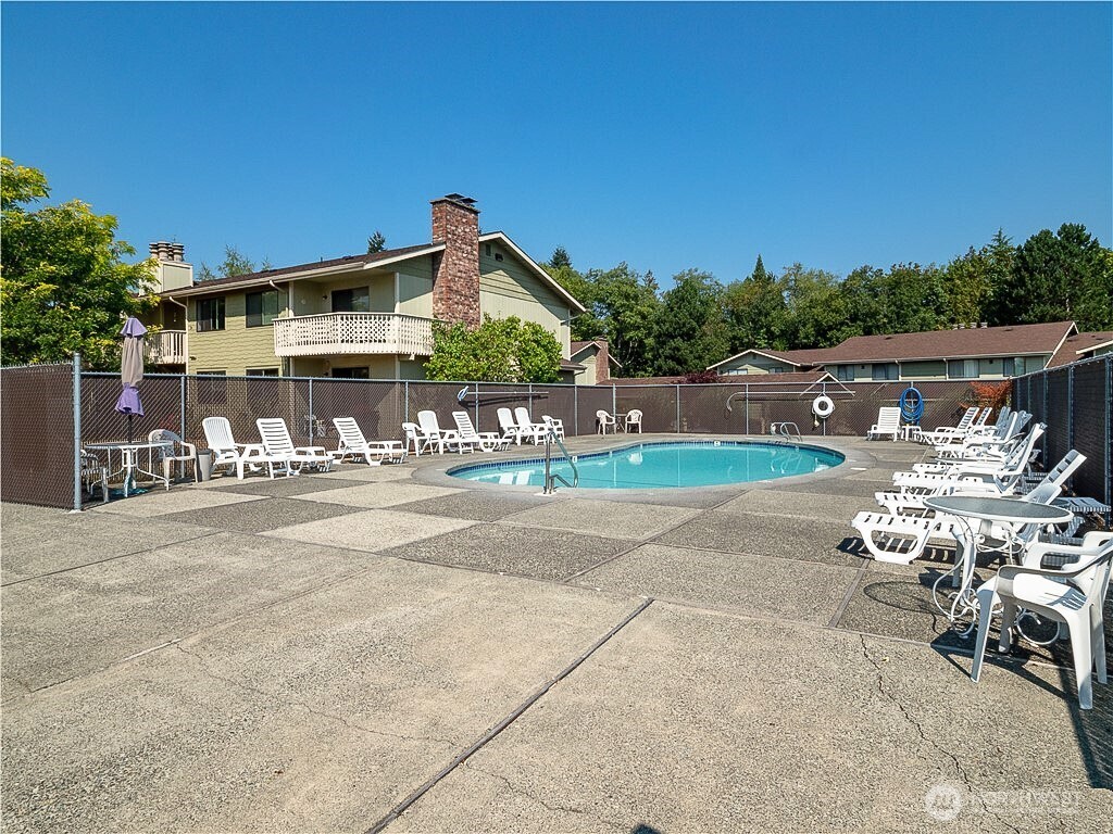 3390 Narrows Lane Northeast, Unit 101 Bremerton, WA 98310 - Photo 22 of 29 a outdoor view with a sitting space