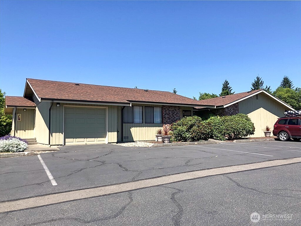 3390 Narrows Lane Northeast, Unit 101 Bremerton, WA 98310 - Photo 28 of 29 a view of a house with a street